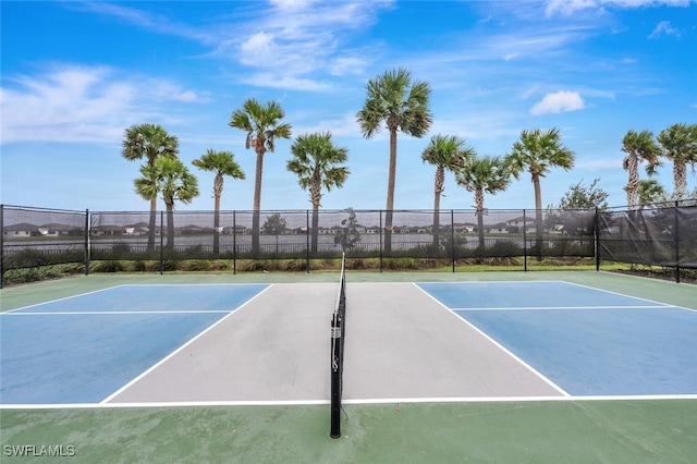 view of tennis court featuring basketball court