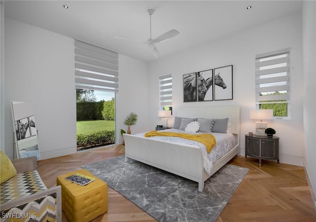 bedroom featuring light parquet floors and ceiling fan