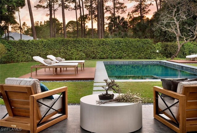 581 Myrtle Rd, Naples, FL 34108 - view of pool featuring a deck and a lawn