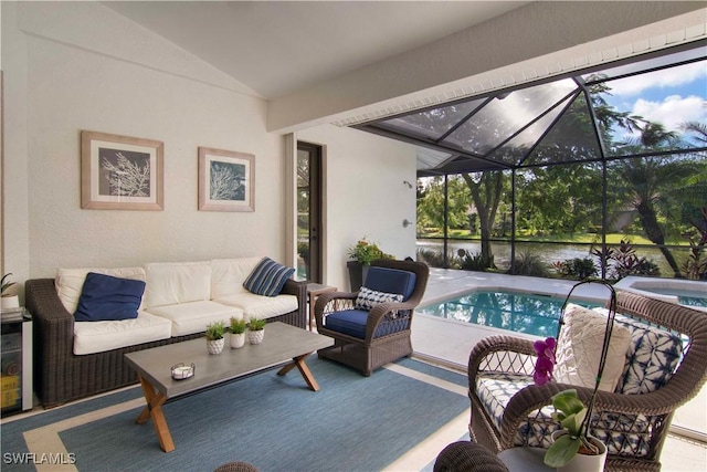 exterior space with a lanai, a pool with hot tub, and an outdoor living space