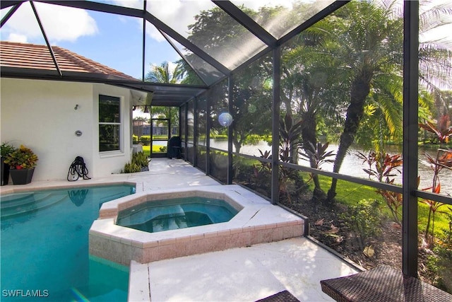 view of swimming pool with a water view, a lanai, and an in ground hot tub