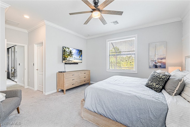 bedroom with ceiling fan, light carpet, and crown molding