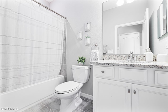 full bathroom with tile patterned floors, vanity, shower / tub combo, and toilet