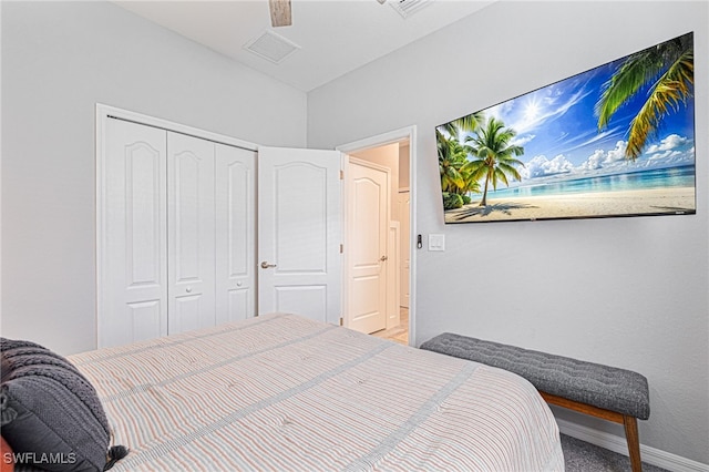 bedroom featuring ceiling fan and a closet