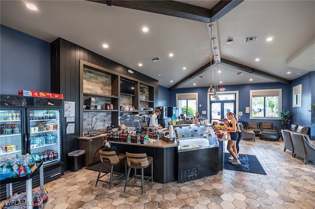 bar featuring decorative light fixtures, plenty of natural light, and lofted ceiling with beams