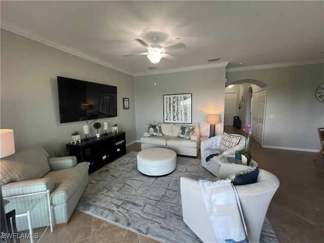 living room featuring ceiling fan and ornamental molding