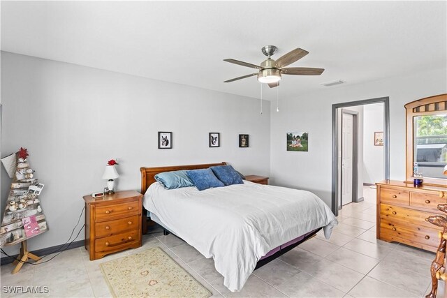 bedroom featuring ceiling fan and light tile patterned floors