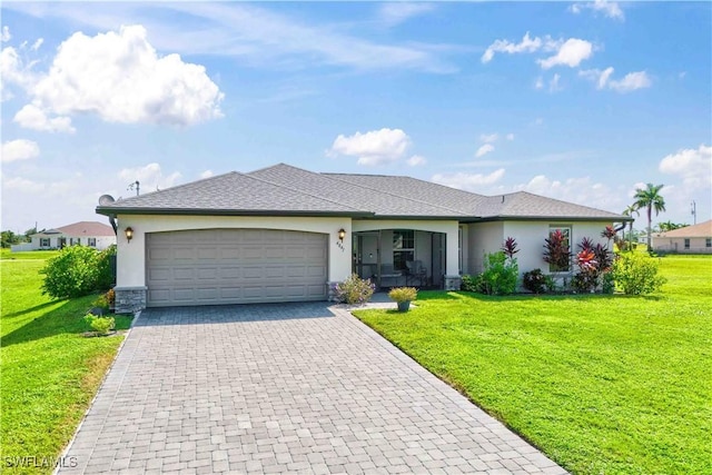 single story home with a garage and a front yard