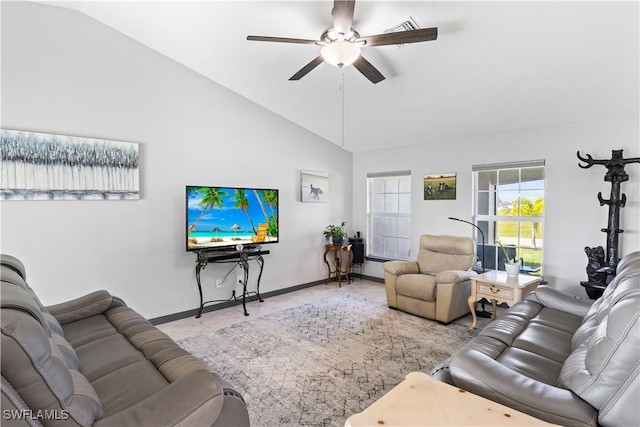 living room with ceiling fan and lofted ceiling