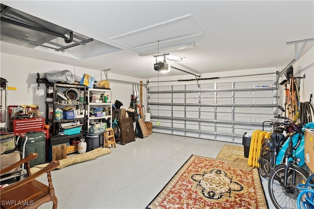 garage featuring a garage door opener