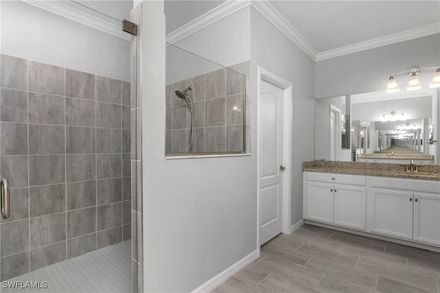 19644 The Place Blvd, Estero, FL 33928 - full bath with tiled shower, ornamental molding, vanity, and baseboards