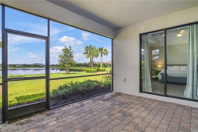 19644 The Place Blvd, Estero, FL 33928 - unfurnished sunroom with a water view