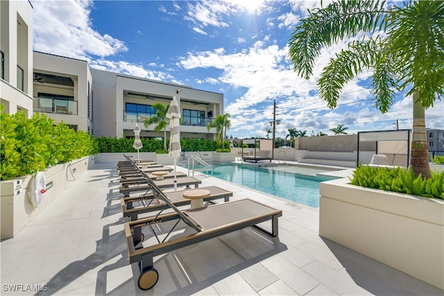 view of pool with a patio area