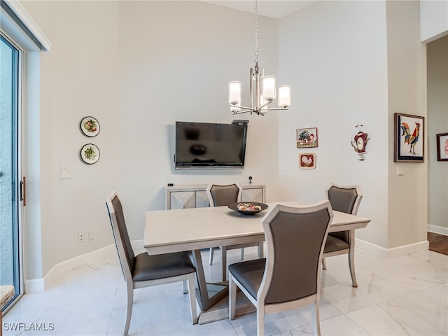 dining room featuring a chandelier