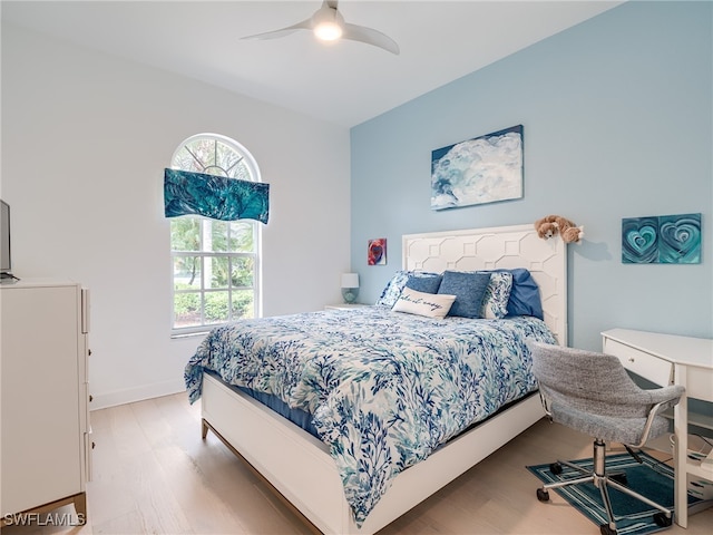 bedroom featuring hardwood / wood-style flooring and ceiling fan