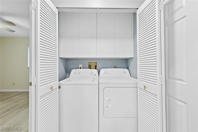 clothes washing area with cabinets, ceiling fan, separate washer and dryer, and light wood-type flooring