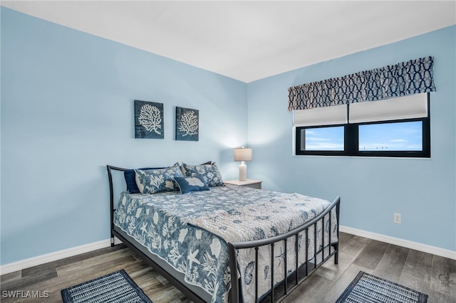 bedroom featuring hardwood / wood-style flooring