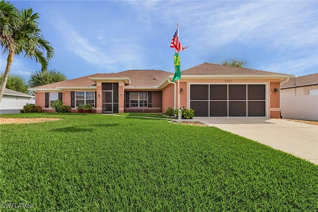 ranch-style home featuring a garage and a front yard