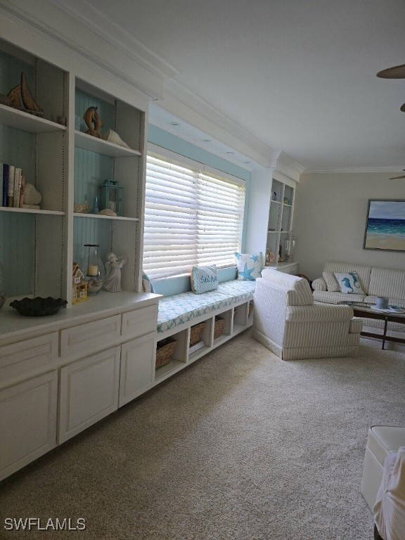 bedroom with light carpet and ornamental molding