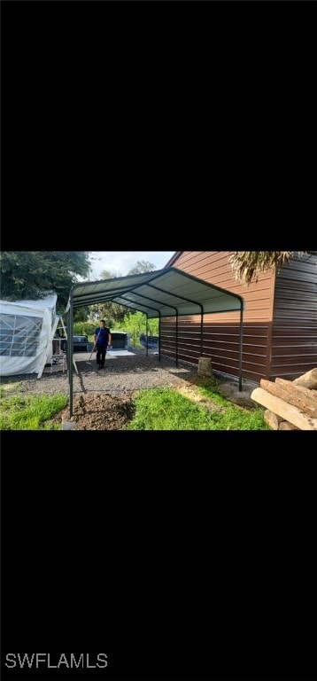 view of yard with a carport