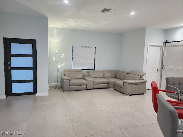 living room with a barn door