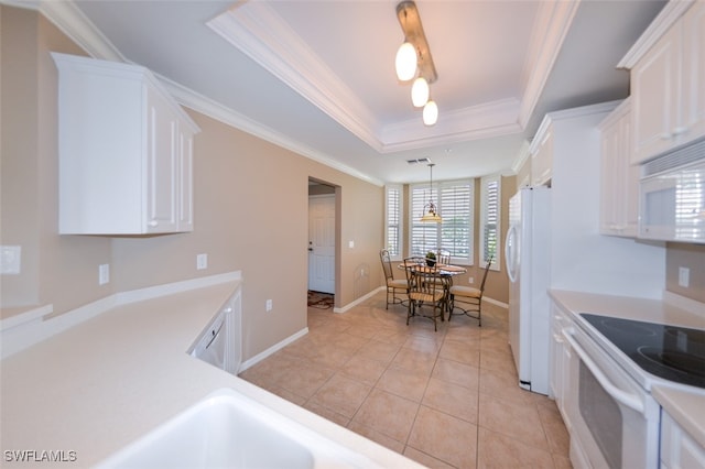 kitchen featuring white cabinetry, white appliances, decorative light fixtures, and ornamental molding