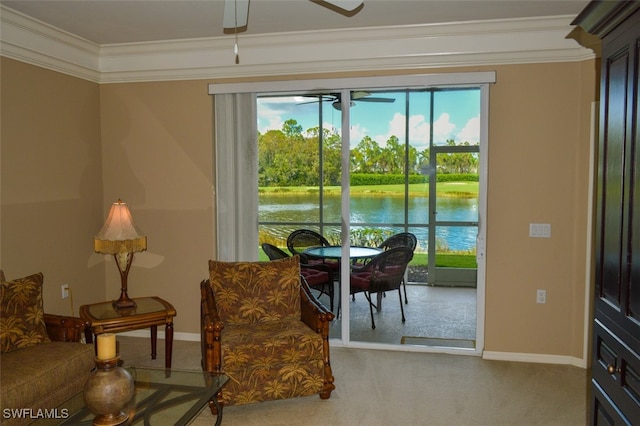 interior space featuring carpet, plenty of natural light, and a water view