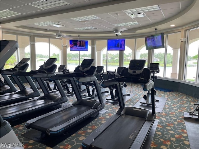 workout area with a drop ceiling and visible vents