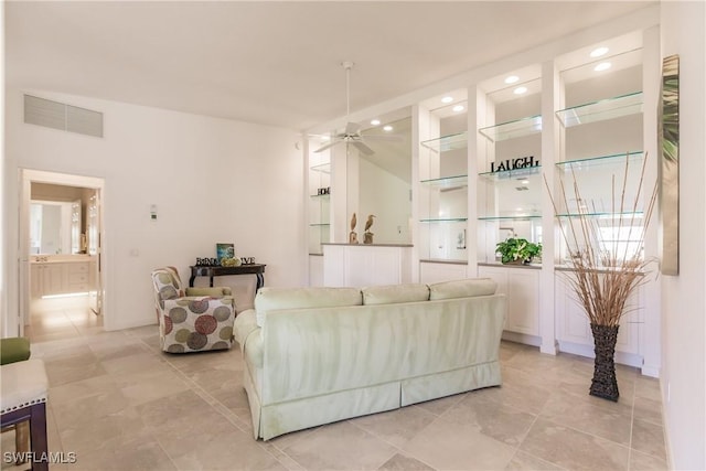 living room featuring a ceiling fan, recessed lighting, and visible vents