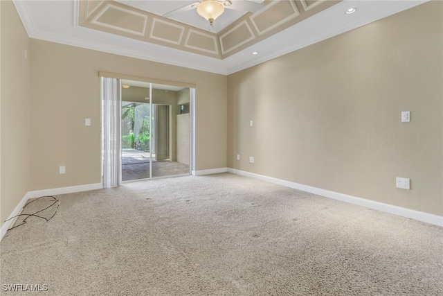 carpeted empty room with crown molding and ceiling fan