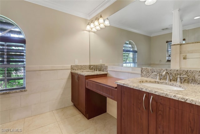 bathroom with vanity, tile walls, ornamental molding, and tile patterned floors