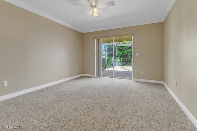 unfurnished room with crown molding, carpet, and ceiling fan