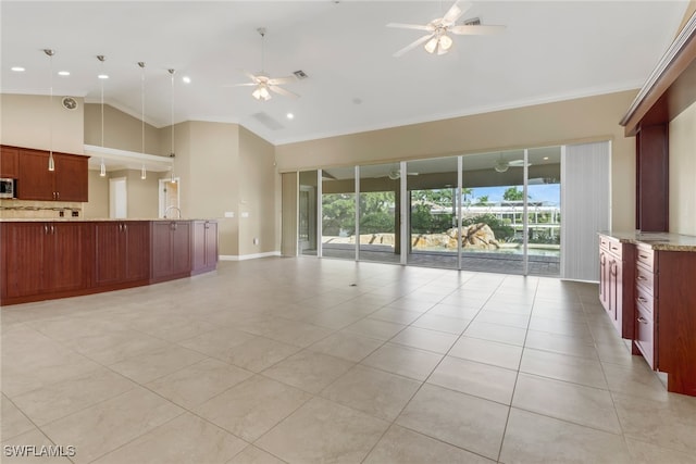 unfurnished living room with ceiling fan and light tile patterned flooring