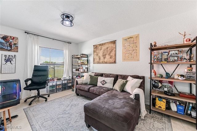 office space featuring tile patterned flooring and a textured ceiling