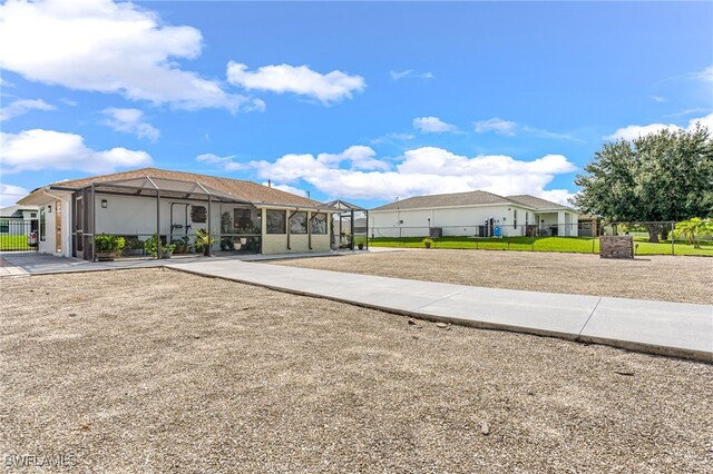 view of property's community with a yard