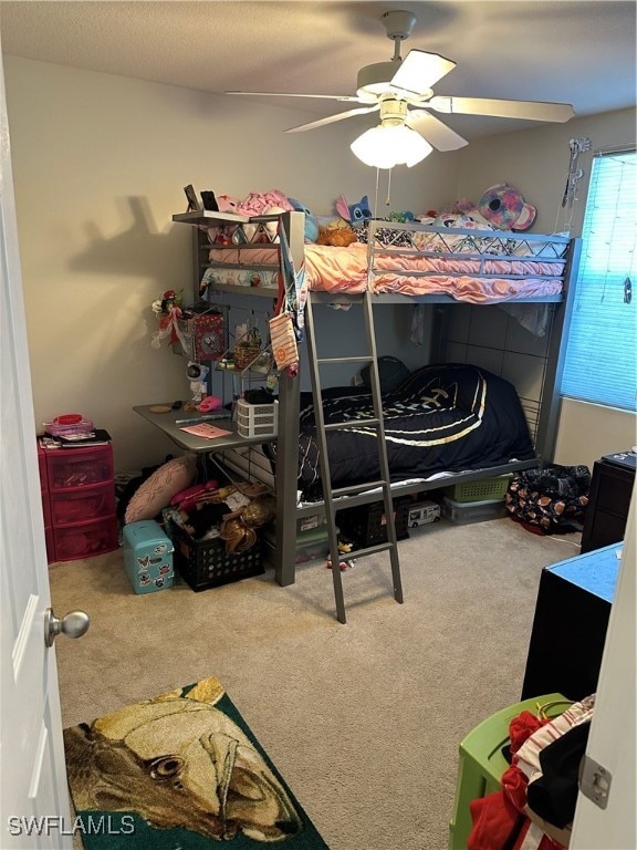 bedroom featuring carpet and ceiling fan