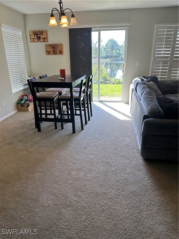 view of carpeted dining space