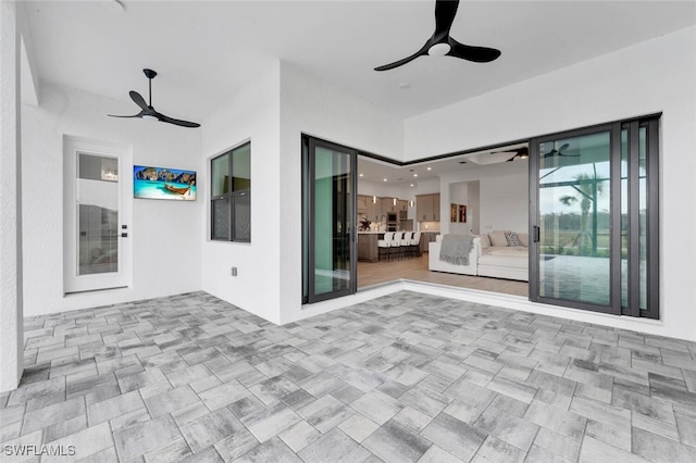 view of patio / terrace with ceiling fan