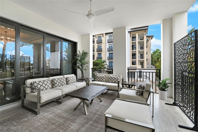 balcony with ceiling fan and an outdoor hangout area