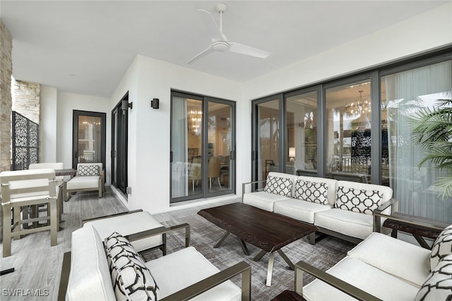 view of patio featuring an outdoor living space and ceiling fan