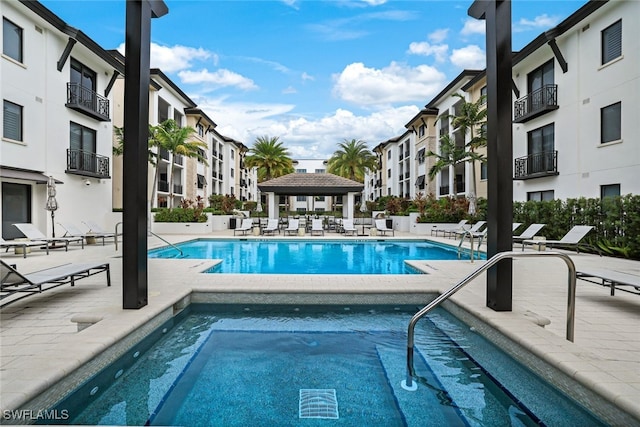 view of pool with a gazebo and a patio