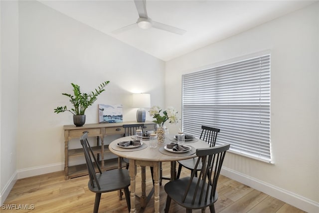 dining space featuring ceiling fan and light hardwood / wood-style floors