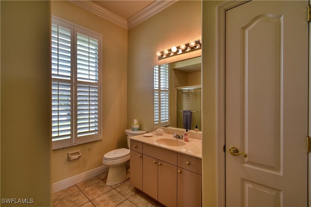 bathroom featuring plenty of natural light, a shower with door, vanity, and toilet