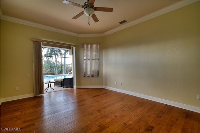 unfurnished room with ceiling fan, ornamental molding, and hardwood / wood-style floors