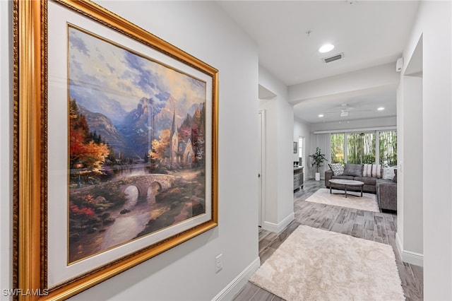 hallway featuring hardwood / wood-style floors