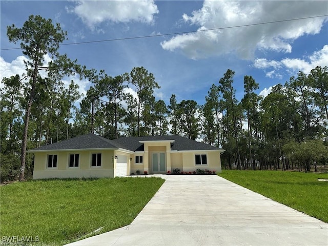 7655 19th Pl, Labelle, FL 33935 - ranch-style house featuring concrete driveway, a garage, a front yard, and stucco siding