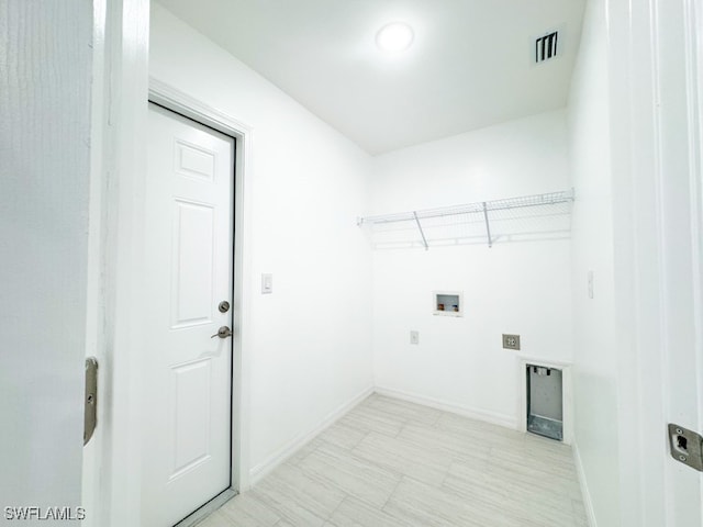 laundry room with hookup for an electric dryer and washer hookup