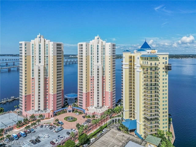 birds eye view of property with a water view