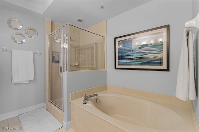 bathroom featuring independent shower and bath and tile patterned floors