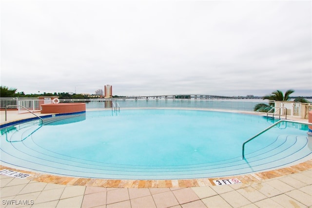 view of swimming pool featuring a patio area